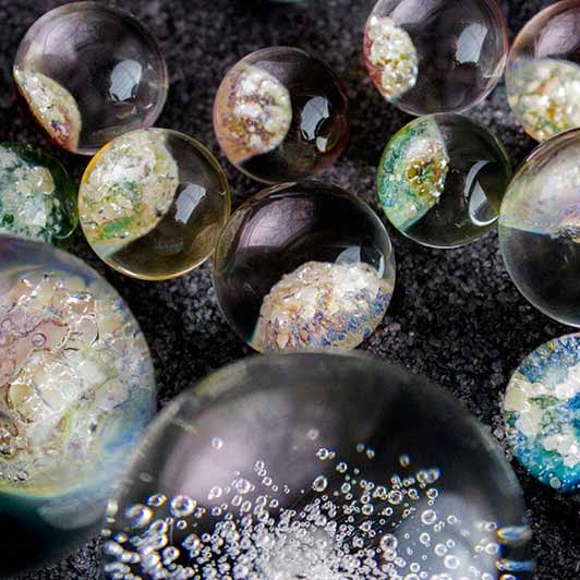 Different sizes and designs of cremation marbles